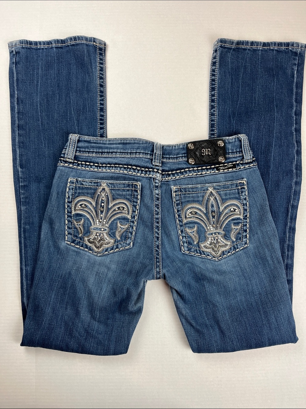 Miss Me Blue Boot Cut Jeans with Embroidered Fleur-de-Lis Pockets